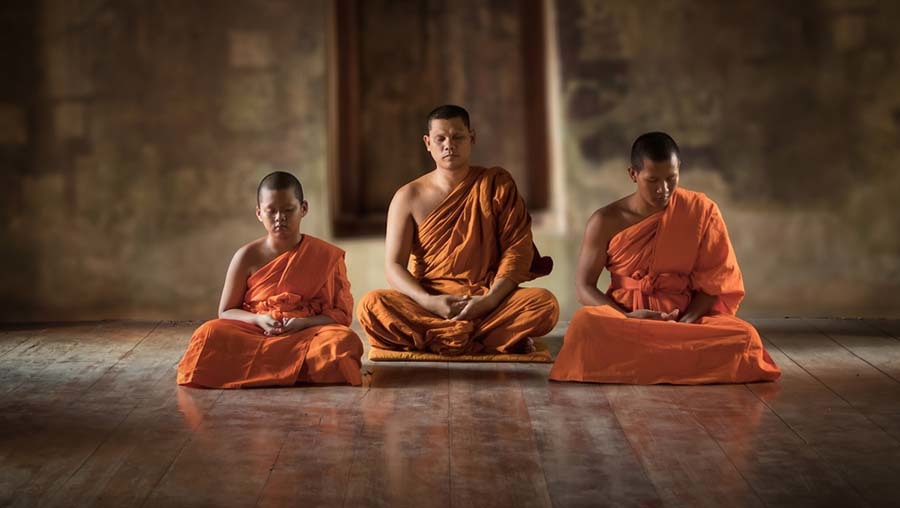 Buddhistische Mönche bei der Meditation Buddhistische Mönche bei der Meditation